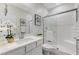 Clean bathroom with white vanity and glass shower at 712 Rogue Wave St, Las Vegas, NV 89138