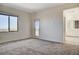 Bright bedroom with ensuite bathroom access and city views at 712 Rogue Wave St, Las Vegas, NV 89138