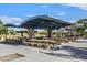 Large covered picnic area with multiple tables at 7933 Decker Canyon Dr # 101, Las Vegas, NV 89128