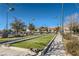 Outdoor bocce ball court with green artificial turf at 7933 Grey Teal St, North Las Vegas, NV 89084