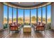 Common area with seating, large windows, and mountain views at 7933 Grey Teal St, North Las Vegas, NV 89084