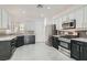 Modern kitchen featuring granite countertops and stainless steel appliances at 7933 Grey Teal St, North Las Vegas, NV 89084