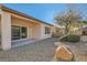 Covered patio with sliding glass doors leading to backyard at 7933 Grey Teal St, North Las Vegas, NV 89084