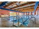 Community indoor swimming pool with lanes and seating at 7933 Grey Teal St, North Las Vegas, NV 89084