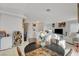 Bright dining area with a wooden table and chairs, adjacent to the kitchen at 8113 Hercules Dr, Las Vegas, NV 89128