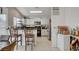 Kitchen boasts granite countertops and white cabinetry at 8113 Hercules Dr, Las Vegas, NV 89128