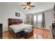 Spacious main bedroom with wood floors and ceiling fan at 8113 Hercules Dr, Las Vegas, NV 89128