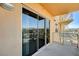 Spacious balcony with sliding glass doors and city views at 8255 S Las Vegas Bl Blvd # 718, Las Vegas, NV 89123