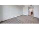 Bright bedroom with grey carpet and access to a bathroom at 8255 S Las Vegas Bl Blvd # 718, Las Vegas, NV 89123