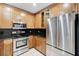 Kitchen features stainless steel appliances and light wood cabinets at 8255 S Las Vegas Bl Blvd # 718, Las Vegas, NV 89123