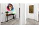 Bright entryway with modern console table and artwork at 8535 Black Brush Ln, Las Vegas, NV 89131