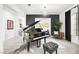 Sophisticated music room with a grand piano and modern decor at 8535 Black Brush Ln, Las Vegas, NV 89131