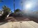 Desert landscape with a paved patio area at 8553 Last Point Ave, Las Vegas, NV 89129