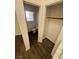 Small bathroom with toilet and storage closet at 8553 Last Point Ave, Las Vegas, NV 89129