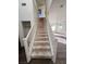 Clean staircase leading to the second floor of the home at 8553 Last Point Ave, Las Vegas, NV 89129