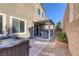 Private backyard oasis with hot tub and patio at 87 Newton Ridge Way, Las Vegas, NV 89183