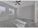 Bright bedroom with carpet flooring and large windows at 87 Newton Ridge Way, Las Vegas, NV 89183