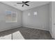 Bright bedroom with neutral walls and carpet at 87 Newton Ridge Way, Las Vegas, NV 89183