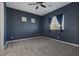 Simple bedroom with neutral walls and carpet at 87 Newton Ridge Way, Las Vegas, NV 89183