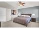 Spacious bedroom with a king-size bed and nightstands at 8753 Arawana Pl, Henderson, NV 89074