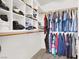 Large walk-in closet with ample shelving and hanging space at 8753 Arawana Pl, Henderson, NV 89074