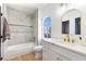 Modern bathroom with marble shower surround and gold accents at 9 White Tail Ct, Henderson, NV 89074