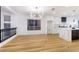 Bright dining area with modern chandelier and hardwood floors at 9 White Tail Ct, Henderson, NV 89074