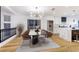 Modern dining room with a large table and contemporary chandelier at 9 White Tail Ct, Henderson, NV 89074