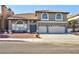 Two-story home with attractive facade and landscaping at 9 White Tail Ct, Henderson, NV 89074