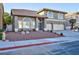 Lovely two-story home with a two-car garage and nicely landscaped front yard at 9 White Tail Ct, Henderson, NV 89074