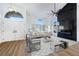 Bright living room with large windows and hardwood floors at 9 White Tail Ct, Henderson, NV 89074