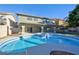 Large kidney shaped pool and spa with patio at 9 White Tail Ct, Henderson, NV 89074