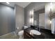 Stylish bathroom with dark vanity and updated fixtures at 900 Las Vegas Blvd # 901, Las Vegas, NV 89101