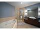 Modern bathroom featuring a soaking tub, shower, and sleek vanity at 900 Las Vegas Blvd # 901, Las Vegas, NV 89101