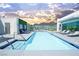 Relaxing rooftop pool area with lounge chairs at 900 Las Vegas Blvd # 901, Las Vegas, NV 89101