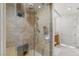 Spa-like bathroom with glass shower, stone tile, and modern fixtures at 9103 Alta Dr # 501, Las Vegas, NV 89145