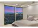 Bedroom with stunning sunset views and private balcony access at 9103 Alta Dr # 501, Las Vegas, NV 89145