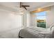 Bright bedroom with city views and a ceiling fan at 9103 Alta Dr # 501, Las Vegas, NV 89145