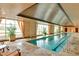 Resort-style indoor lap pool with large windows at 9103 Alta Dr # 501, Las Vegas, NV 89145