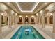 Relaxing indoor pool with decorative tile and fountain at 9103 Alta Dr # 501, Las Vegas, NV 89145