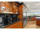 Modern kitchen with breakfast bar and built in coffee bar at 9103 Alta Dr # 501, Las Vegas, NV 89145