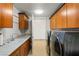 Laundry room with modern washer, dryer, and ample cabinetry at 9103 Alta Dr # 501, Las Vegas, NV 89145