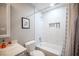 Bathroom with bathtub, shower, and white tile at 915 Vegas Valley Dr # 4, Las Vegas, NV 89109