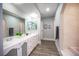 Bright bathroom with dual vanity and marble countertop at 915 Vegas Valley Dr # 4, Las Vegas, NV 89109