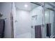 Spa-like bathroom with a walk-in shower and marble tile at 915 Vegas Valley Dr # 4, Las Vegas, NV 89109