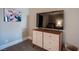 Bedroom with dresser, large TV and neutral decor at 915 Vegas Valley Dr # 4, Las Vegas, NV 89109