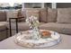 Close up of marble coffee table with flowers and coasters at 915 Vegas Valley Dr # 4, Las Vegas, NV 89109