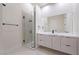 Contemporary bathroom with floating vanity and walk-in shower at 9780 Solar Ave, Las Vegas, NV 89149