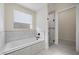 Elegant bathroom featuring a free-standing bathtub at 9780 Solar Ave, Las Vegas, NV 89149