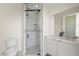 Stylish bathroom with a walk-in shower and floating vanity at 9780 Solar Ave, Las Vegas, NV 89149